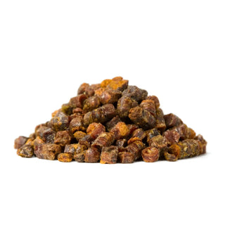 Pile of raw amber propolis